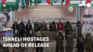 Hamas brings 3 Israeli hostages on stage ahead of release | AFP