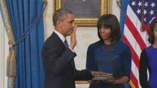 Barack Obama sworn in: President takes oath in front of his family