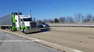 Beautiful Clean Peterbilt Matching Trailer Rolling Down the Highway