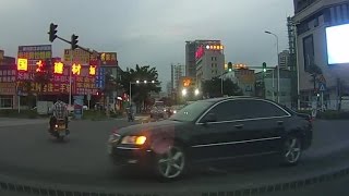 A People's Liberation Army license plate of the Audi car chaos into the road