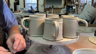 Making duplicate mugs.