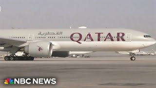 Couple says they were forced to sit next to dead body for hours on Qatar flight