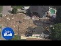 Huge sinkhole swallows homes in Florida and is still growing - Daily Mail