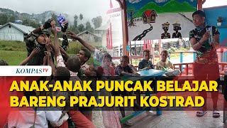 Potret Seru Prajurit Kostrad Bersama Anak-anak Kabupaten Puncak Papua Belajar dan Bermain