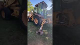 Old good looking backhoe at an auction.