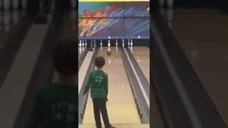 Kid makes an IMPOSSIBLE bowling shot