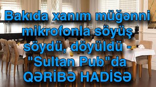 Bakıda xanım müğənni mikrofonla söyüş söydü, döyüldü - \