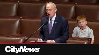 Congressman's son caught making hilarious faces on camera during speech