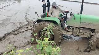 Puddling of land for Rice transplanting