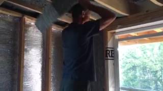 installing recycled denim insulation