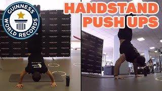 Most handstand push ups in one minute (male) - Guinness World Records