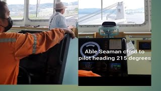 ABLE SEAMAN SHOWING SUPERB HAND STEERING WHILE PROCEEDING TO BERTH