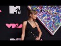 Taylor Swift gets a leg up in slinky black Versace on VMAs 2023 red carpet