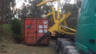 4WD Container Hunting Expedition. Container Transport via Side Loader.