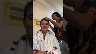 Woman Shaving Her Hair