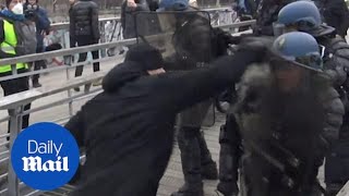 Former boxer punches police during Paris yellow vest protest