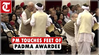 PM Modi touches feet of Padma Shri Awardee Drona Bhuyan