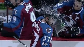 Compher gets drenched with water after scoring first NHL goal