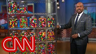 CNN anchor counts Trump's false claims using gumballs