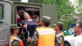 Beijing evacuates more flood-affected residents