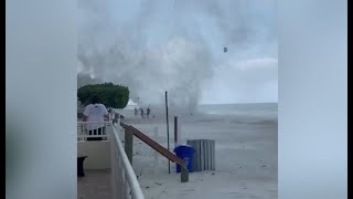 WATCH: Waterspout comes ashore, chases Florida beachgoers in viral video
