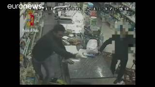 Watch: Robber smashes shopkeeper with bottle in raid in Italy