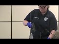 Dozens of crime scene photos, murder weapon shown in trial of man accused of killing stepfather