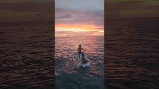 Paddle board and sunset