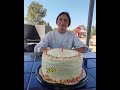 Rich man gives cake filled with money to a student to help her support her family
