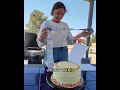 Rich man gives cake filled with money to a student to help her support her family