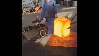 Hammering hot iron rod