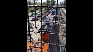 5 G.E. GEVO's start a heavy stack train at Fullerton, California.