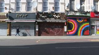 Coronavirus: shops closed in London but people still out in streets | AFP