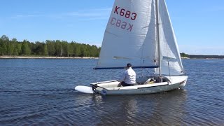 The blade automatically kicks up on a 470-class sailboat.