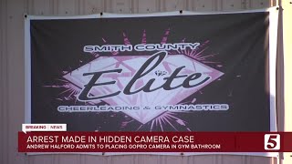 Man arrested, admits to putting camera in gym bathroom