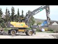 volvo ew 230 c mobilbagger mit oil quick bei abbrucharbeiten hd