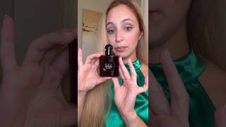 YSL Black Opium Perfume over red , YSL Fragrances , luxury perfumes , luxury brand, beauty