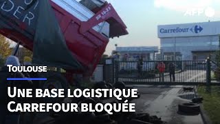 Près de Toulouse, une plateforme logistique Carrefour bloquée par la Coordination rurale | AFP