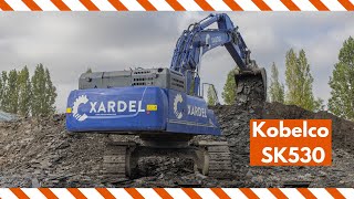 Massive Kobelco SK530 from Xardel digging shale