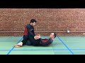 sweep a bigger person from half guard knee lever bjj grappling