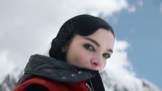 Down jackets, fashion in Moncler style. Creative progressive down jackets. Girls in down jackets