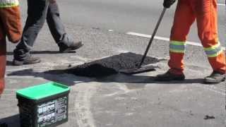 Potholes being repaired in Brazil using Ultracrete Instant Road Repair