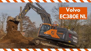 Mighty Volvo EC 380E from AlphaBau stripping topsoil and clearing ridges