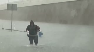 Houston resident seen walking in knee-high flood waters on northeast side
