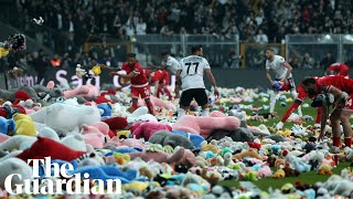 Toys thrown on pitch by Besiktas fans for children affected by Turkey earthquake