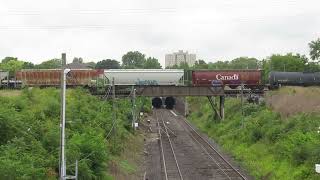 Essex Terminal crossing the CPR Tunnel with cars from CN for Ojibway Yard. August. 30/2022.