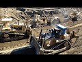 CAT D10N and D9L Dozers pushing 651B  scrapers - D10T ripping rock and dirt