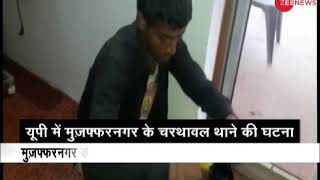 Accused seen mopping the floor in Muzaffarnagar's Charthawal Police Station