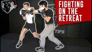 Punching While Moving Backwards: 5 Boxing Footwork Patterns