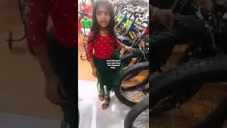 Aami Mol buy a new cycle from Tirur National shop.